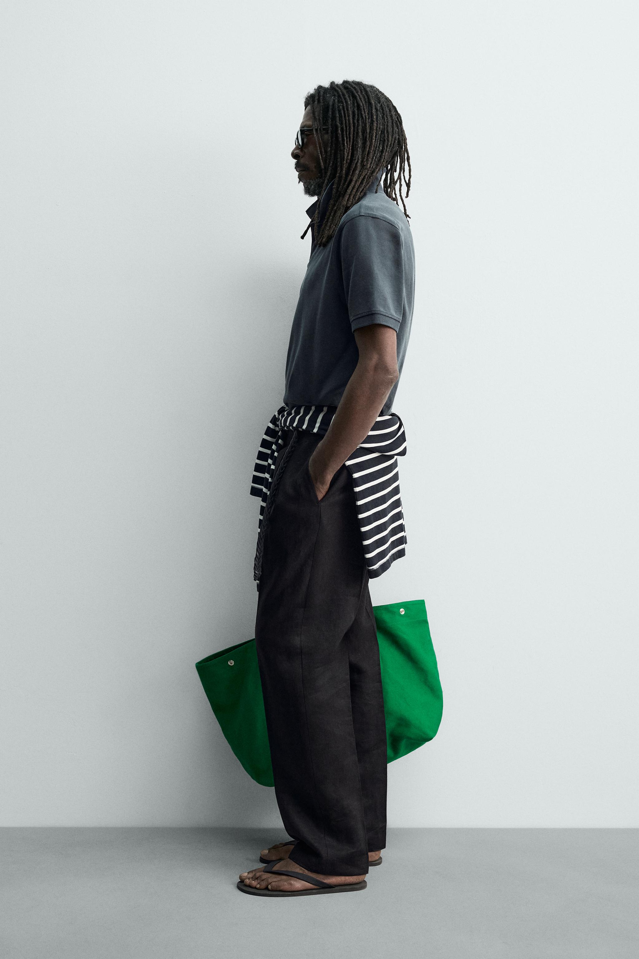 POLO EN PIQUÉ DÉLAVÉ AARON LEVINE X ZARA